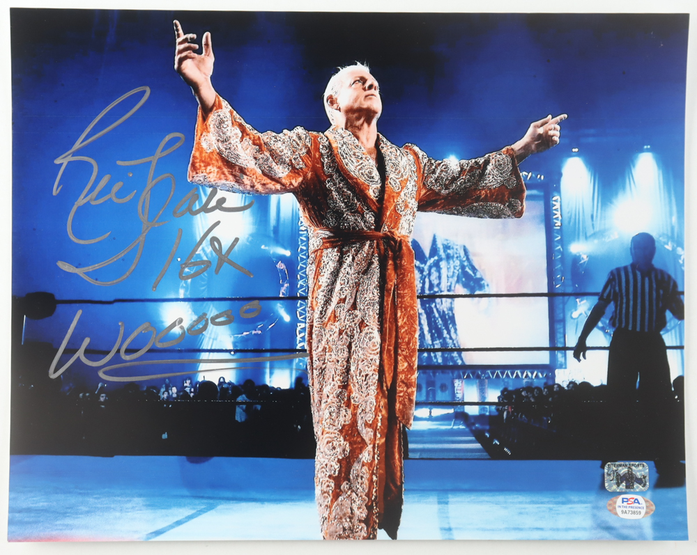 Ric Flair Signed WWE 11x14 Photo Inscribed "16x" & "Wooooo" (Flair & PSA) at PristineAuction.com Ric Flair Signed WWE 11x14 Photo Inscribed "16x" & "Wooooo" (Flair & PSA) at PristineAuction.com