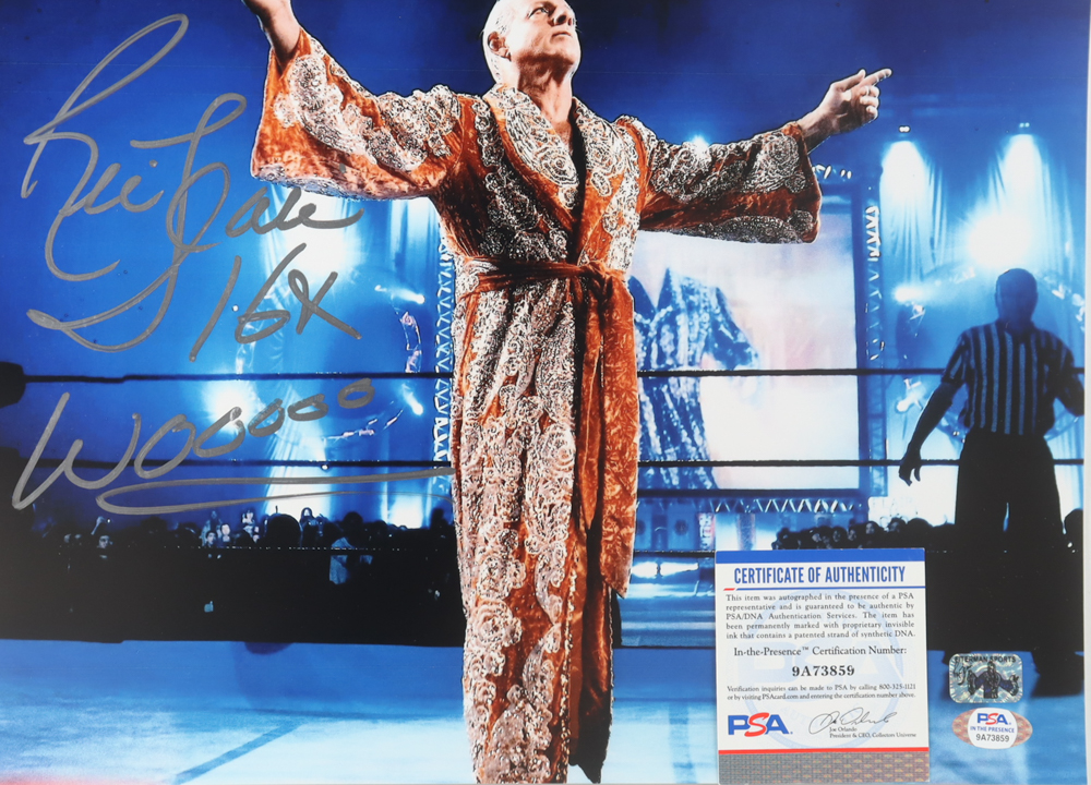 Ric Flair Signed WWE 11x14 Photo Inscribed "16x" & "Wooooo" (Flair & PSA) at PristineAuction.com Ric Flair Signed WWE 11x14 Photo Inscribed "16x" & "Wooooo" (Flair & PSA) at PristineAuction.com