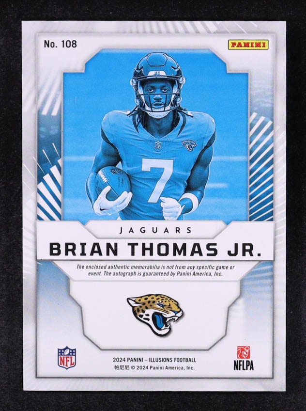 Brian Thomas Jr. 2024 Panini Illusions Trophy Collection Bronze JSY AU #108 #213/299 RC at PristineAuction.com Brian Thomas Jr. 2024 Panini Illusions Trophy Collection Bronze JSY AU #108 #213/299 RC at PristineAuction.com