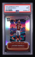 Jayden Daniels 2024 Donruss Optic Uptowns #2 RC (PSA 9) at PristineAuction.com