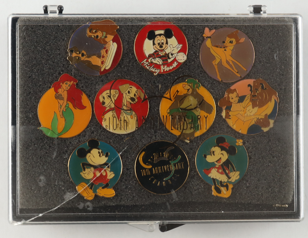 Vintage Disney Channel 10th Anniversary Set of (10) Pin Set With Mickey, Minnie, Ariel & Bambi at PristineAuction.com Vintage Disney Channel 10th Anniversary Set of (10) Pin Set With Mickey, Minnie, Ariel & Bambi at PristineAuction.com