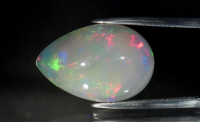 11.50 Carats Natural White Opal Loose at PristineAuction.com