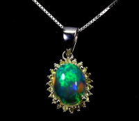 2.10 Carats Opal & Yellow Sapphire Pendant with Chain | $1,700 Estimated Retail Value (UGL Cert) | Brand New at PristineAuction.com