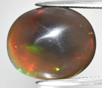 13.38 Carats Natural Black Opal Loose | Estimated Retail Value: $3,000 (UGL Cert) at PristineAuction.com