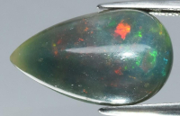 8.30 Carats Natural Black Opal Loose | Estimated Retail Value: $2,100 (UGL Cert) at PristineAuction.com