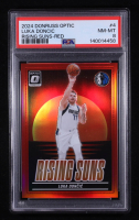 Luka Doncic 2024-25 Donruss Optic Rising Suns Red #4 #57/99 (PSA 8) at PristineAuction.com
