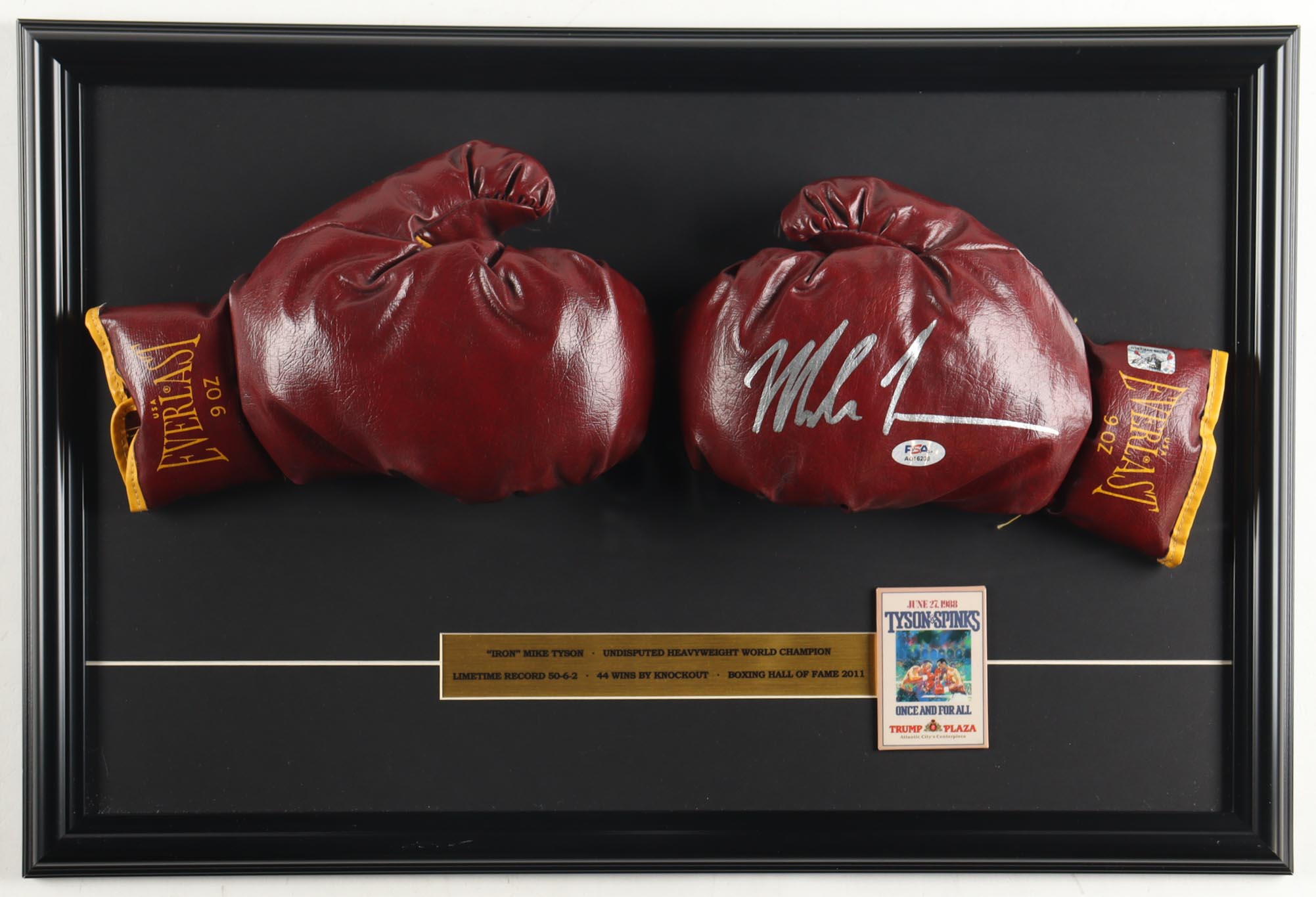 Mike Tyson Signed Vintage Custom Framed Set of (2) 1970 Everlast Boxing Gloves with 1988 Trump Plaza Fight Pin & Stat Plaque (Tyson & PSA) at PristineAuction.com Mike Tyson Signed Vintage Custom Framed Set of (2) 1970 Everlast Boxing Gloves with 1988 Trump Plaza Fight Pin & Stat Plaque (Tyson & PSA) at PristineAuction.com