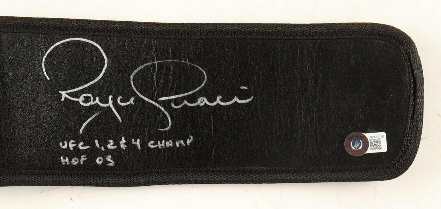 Royce Gracie Signed Full-Size UFC World Superfight Champion Belt Inscribed "UFC 1, 2, & 4 Champ" & "HOF 03" (Beckett) at PristineAuction.com Royce Gracie Signed Full-Size UFC World Superfight Champion Belt Inscribed "UFC 1, 2, & 4 Champ" & "HOF 03" (Beckett) at PristineAuction.com