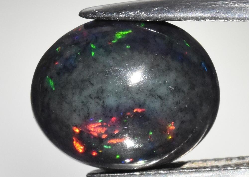 5.73 Carats Natural Black Opal Loose at PristineAuction.com 5.73 Carats Natural Black Opal Loose at PristineAuction.com