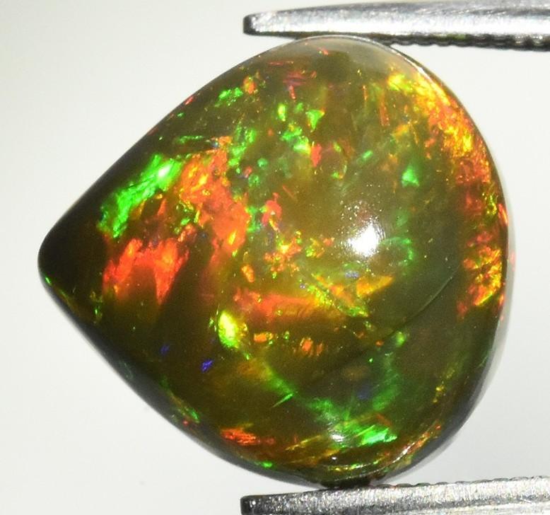 4.90 Carats Natural Black Opal Loose at PristineAuction.com 4.90 Carats Natural Black Opal Loose at PristineAuction.com