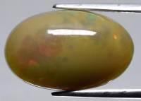 5.11 Carats Natural Yellow Opal Loose at PristineAuction.com