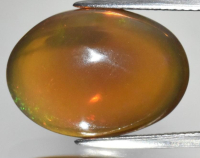 12.59 Carats Natural Yellow Opal Loose | Estimated Retail Value: $1,600 (UGL Cert) at PristineAuction.com