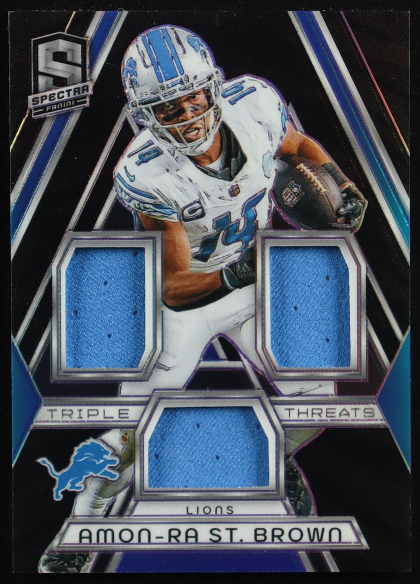 Amon-Ra St. Brown 2024 Panini Spectra Triple Threats Materials #15 #15/99 at PristineAuction.com Amon-Ra St. Brown 2024 Panini Spectra Triple Threats Materials #15 #15/99 at PristineAuction.com