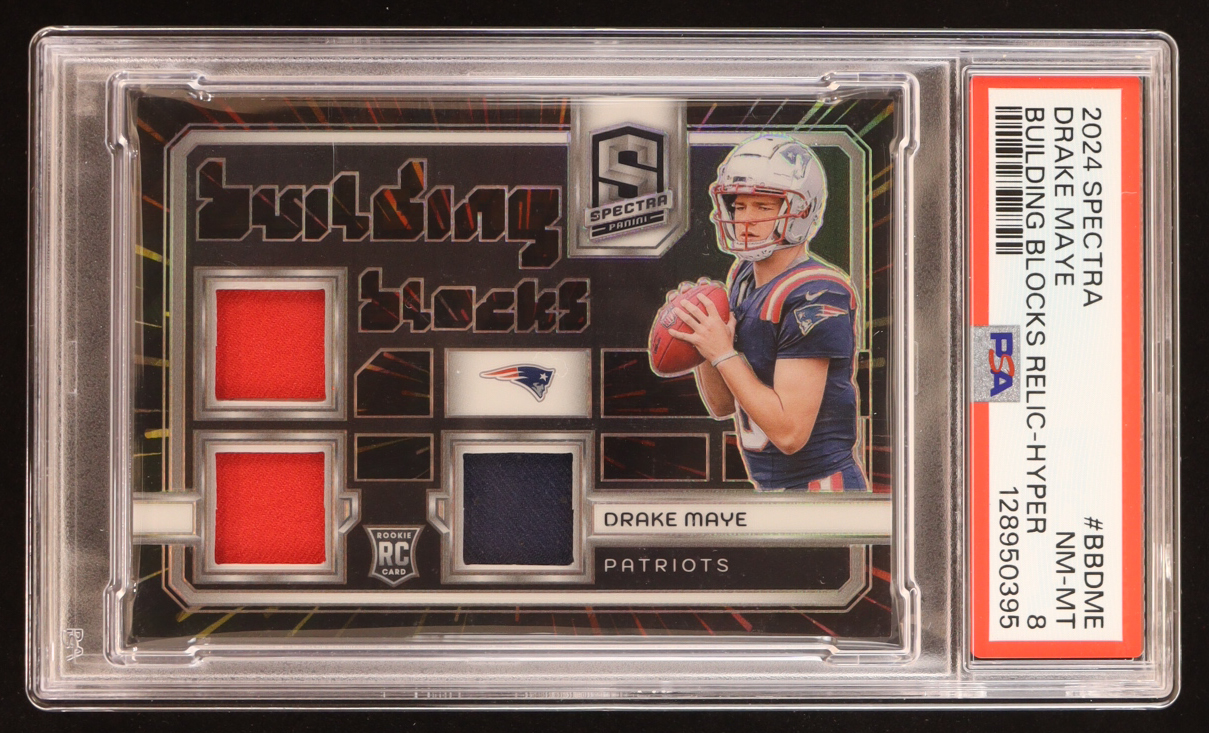 Drake Maye 2024 Panini Spectra Building Blocks Relic Hyper #BBD-ME RC #59/75 (PSA 8) at PristineAuction.com Drake Maye 2024 Panini Spectra Building Blocks Relic Hyper #BBD-ME RC #59/75 (PSA 8) at PristineAuction.com