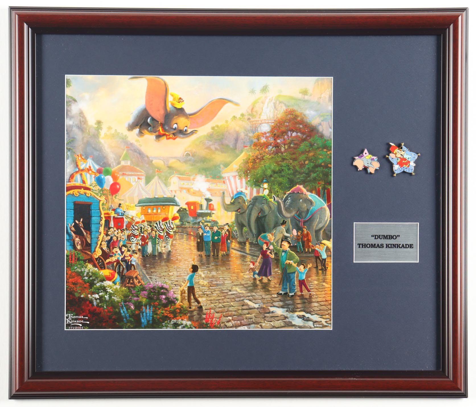 Thomas Kinkade "Dumbo The Flying Elephant" Custom Framed Print Display with Set of (2) Dumbo Pins at PristineAuction.com Thomas Kinkade "Dumbo The Flying Elephant" Custom Framed Print Display with Set of (2) Dumbo Pins at PristineAuction.com