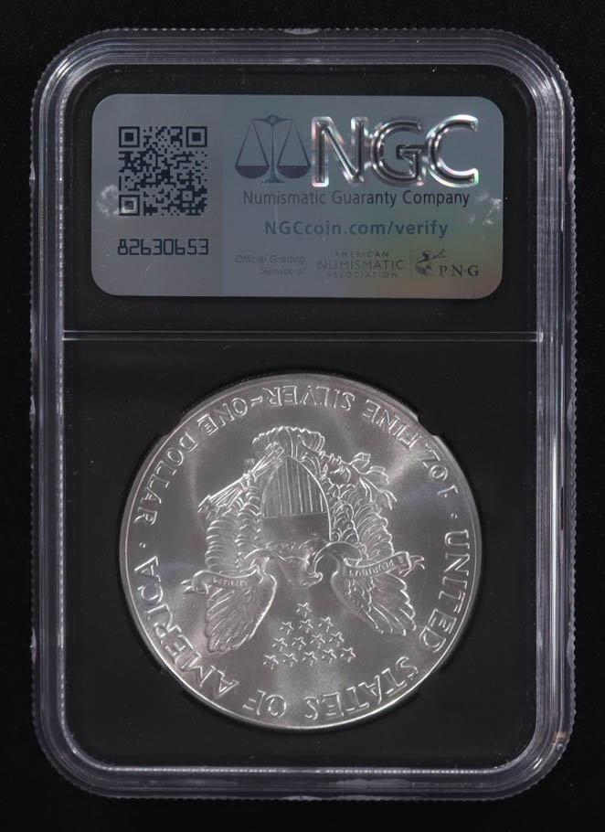 Mint Error 1986-(S) American Silver Eagle $1 Coin Struck at San Francisco Obverse Struck Thru Black Core Holder - Anna Escobedo Cabral Signed Label (NGC MS69) at PristineAuction.com Mint Error 1986-(S) American Silver Eagle $1 Coin Struck at San Francisco Obverse Struck Thru Black Core Holder - Anna Escobedo Cabral Signed Label (NGC MS69) at PristineAuction.com
