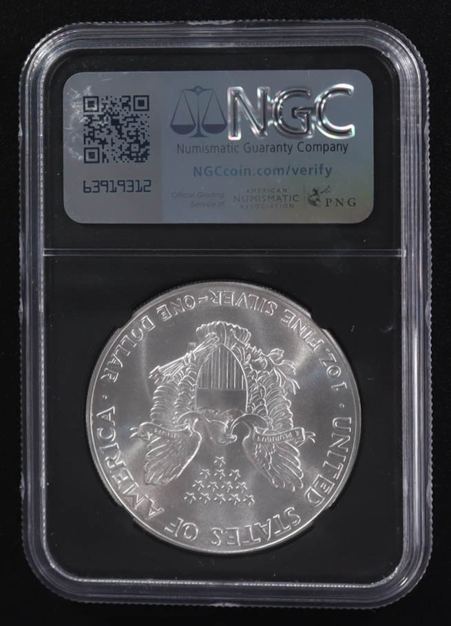 Mint Error 1986-(S) American Silver Eagle $1 Coin Struck at San Francisco Obverse Struck Thru Black Core Holder - Anna Escobedo Cabral Signed Label (NGC MS69) at PristineAuction.com Mint Error 1986-(S) American Silver Eagle $1 Coin Struck at San Francisco Obverse Struck Thru Black Core Holder - Anna Escobedo Cabral Signed Label (NGC MS69) at PristineAuction.com