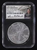 Mint Error 1998 American Silver Eagle $1 Coin Obverse Struck Thru Black Core Holder - Anna Escobedo Cabral Signed Label (NGC MS69) at PristineAuction.com