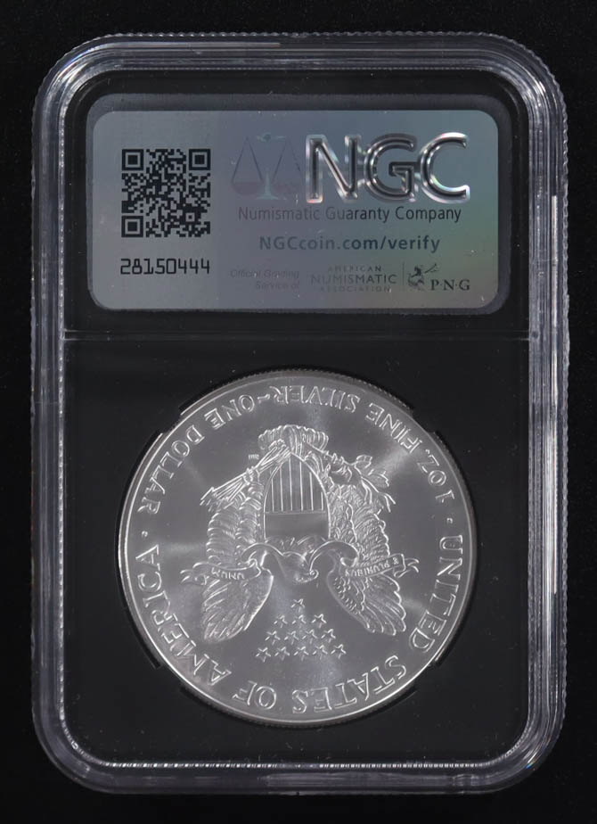 Mint Error 1998 American Silver Eagle $1 Coin Obverse Struck Thru Black Core Holder - Anna Escobedo Cabral Signed Label (NGC MS69) at PristineAuction.com Mint Error 1998 American Silver Eagle $1 Coin Obverse Struck Thru Black Core Holder - Anna Escobedo Cabral Signed Label (NGC MS69) at PristineAuction.com
