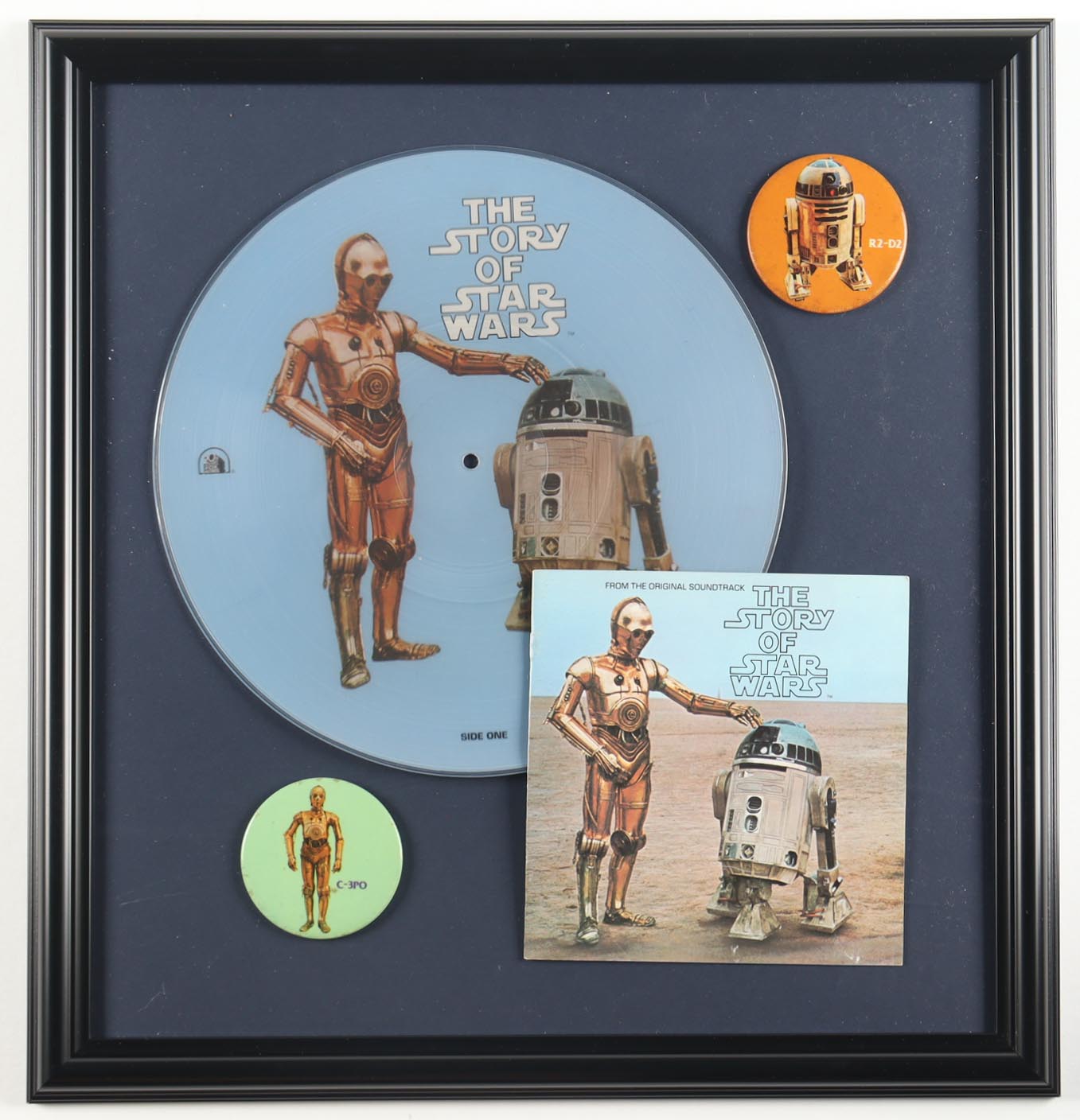 1977 "The Story of STAR WARS" Custom Framed Special Edition Photo Vinyl Record with (2) 1977 Lapel Pins at PristineAuction.com 1977 "The Story of STAR WARS" Custom Framed Special Edition Photo Vinyl Record with (2) 1977 Lapel Pins at PristineAuction.com