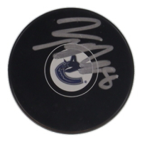 Conor Garland Signed Canucks Logo Hockey Puck (JSA) at PristineAuction.com