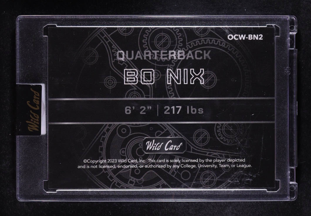 Bo Nix 2023 Wild Card QB1 On the Clock Green and Purple Scope #BN2 RC #1/8 at PristineAuction.com Bo Nix 2023 Wild Card QB1 On the Clock Green and Purple Scope #BN2 RC #1/8 at PristineAuction.com