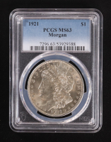 1921 Morgan Silver Dollar - Gold Shield (PCGS MS63) - 53929388 at PristineAuction.com