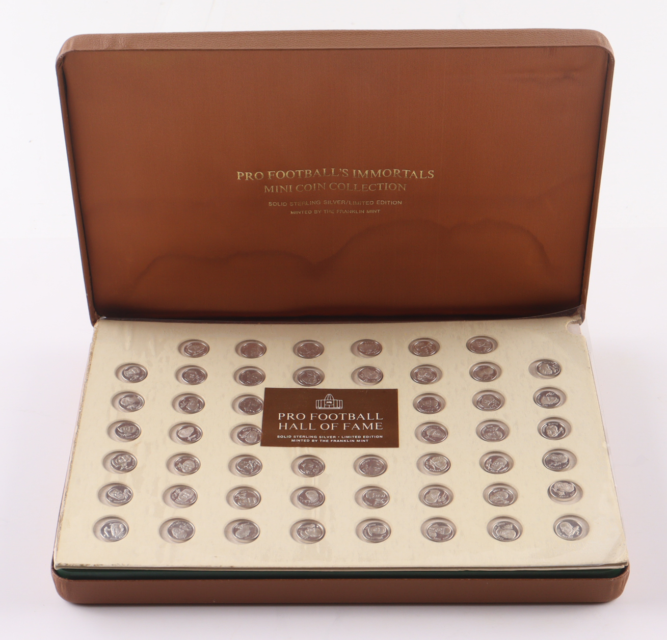 1976 "Pro Football Hall of Fame Immortals" Mini Collection Set With (50) Sterling Silver Coins & Display Case at PristineAuction.com 1976 "Pro Football Hall of Fame Immortals" Mini Collection Set With (50) Sterling Silver Coins & Display Case at PristineAuction.com