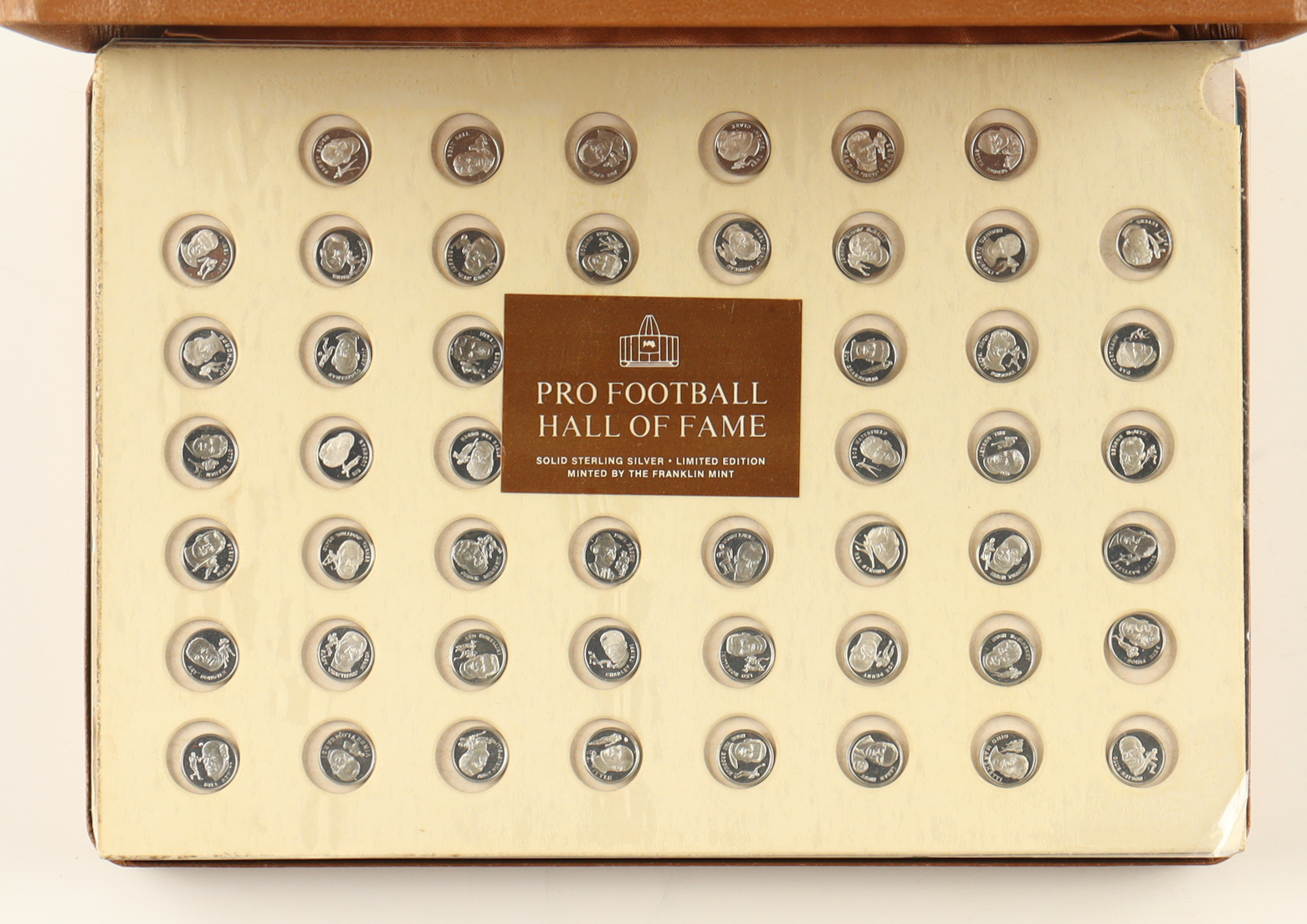1976 "Pro Football Hall of Fame Immortals" Mini Collection Set With (50) Sterling Silver Coins & Display Case at PristineAuction.com 1976 "Pro Football Hall of Fame Immortals" Mini Collection Set With (50) Sterling Silver Coins & Display Case at PristineAuction.com