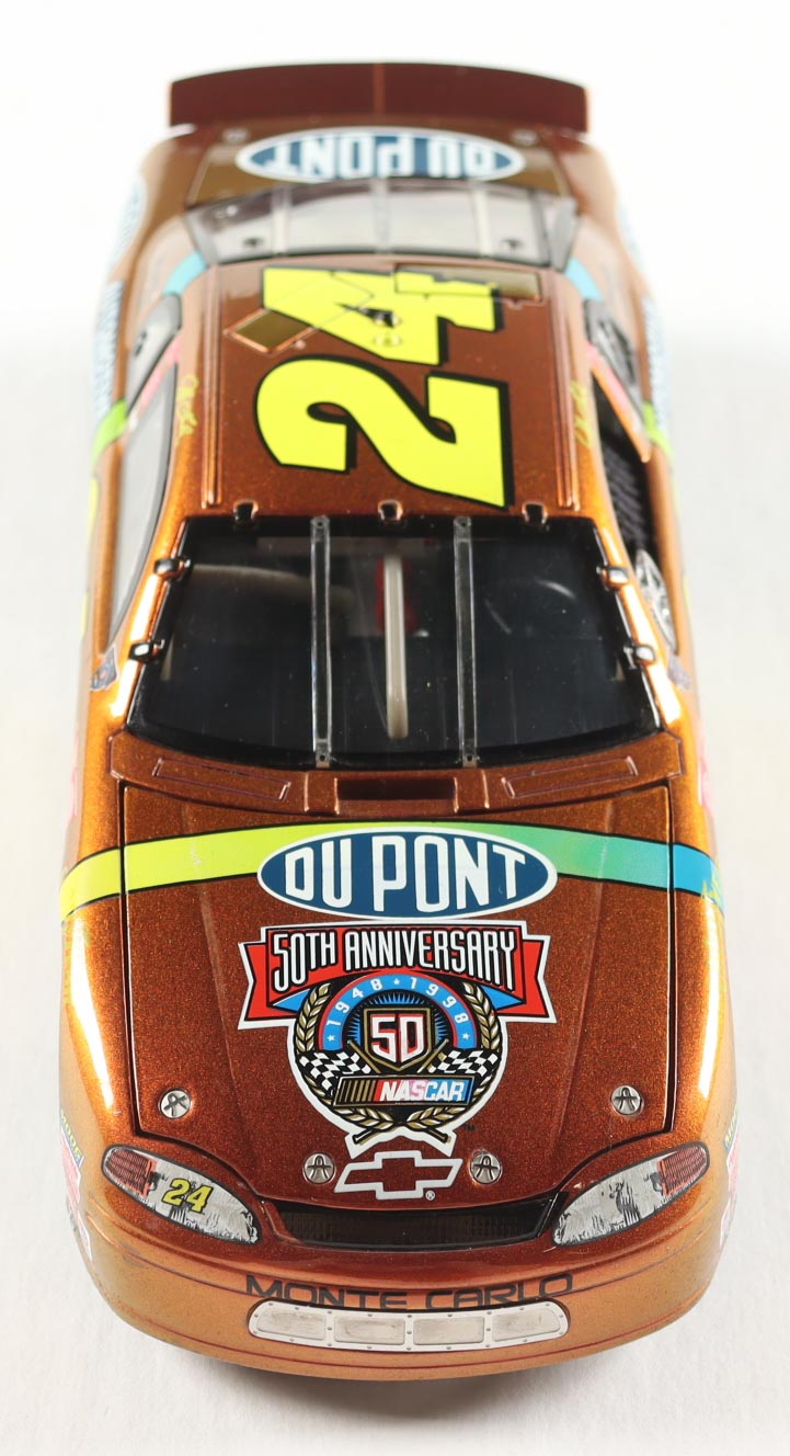 Jeff Gordon LE NASCAR #24 DuPont Chromalusion 1998 Monte Carlo Elite - 1:24 Premium Die-Cast Car at PristineAuction.com Jeff Gordon LE NASCAR #24 DuPont Chromalusion 1998 Monte Carlo Elite - 1:24 Premium Die-Cast Car at PristineAuction.com