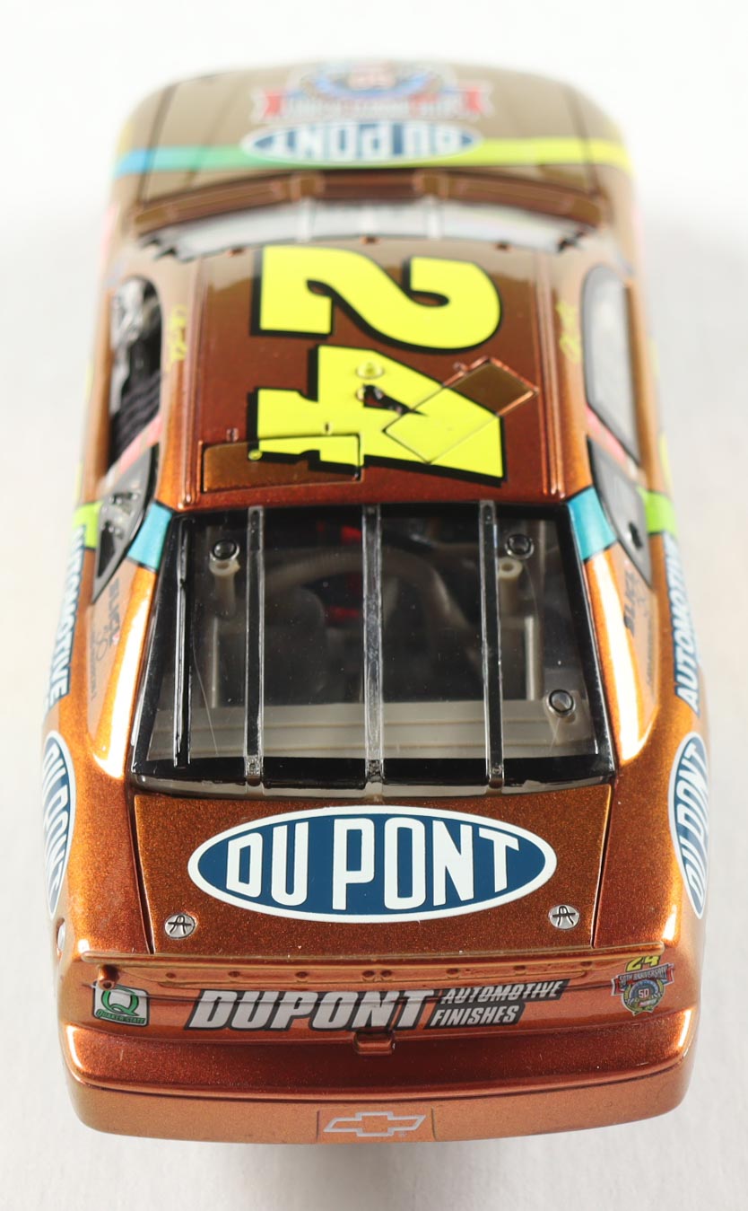 Jeff Gordon LE NASCAR #24 DuPont Chromalusion 1998 Monte Carlo Elite - 1:24 Premium Die-Cast Car at PristineAuction.com Jeff Gordon LE NASCAR #24 DuPont Chromalusion 1998 Monte Carlo Elite - 1:24 Premium Die-Cast Car at PristineAuction.com