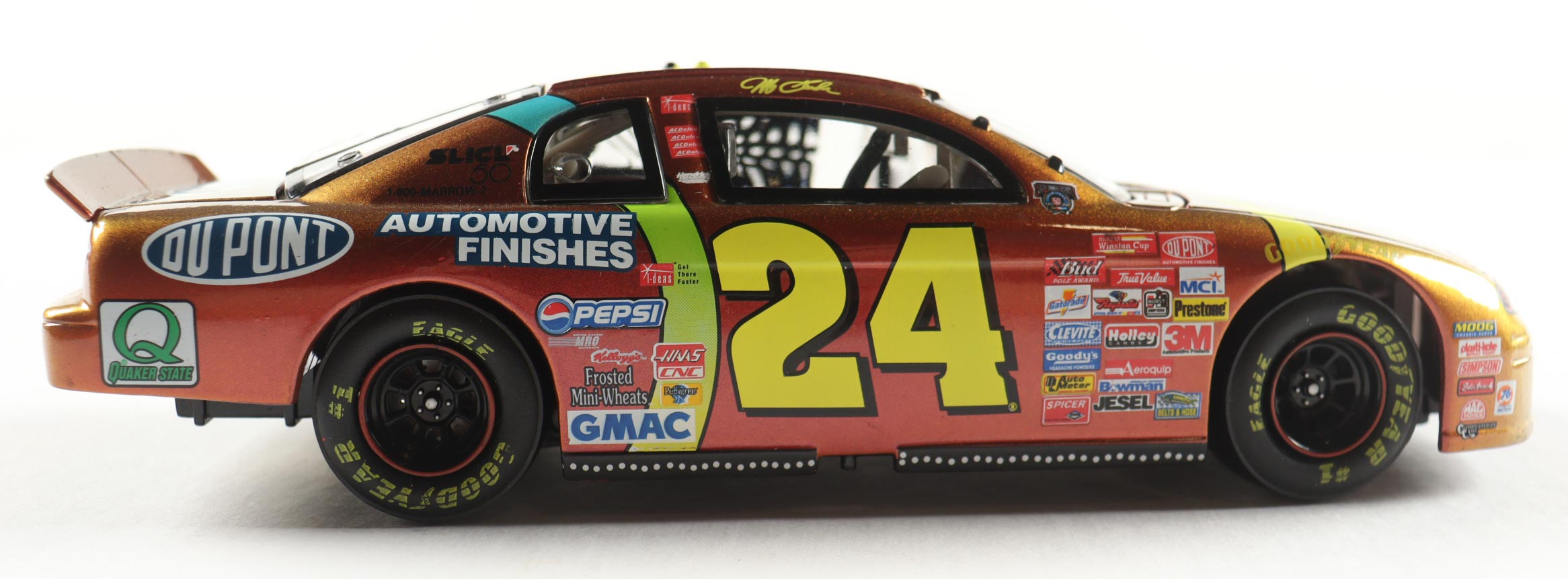 Jeff Gordon LE NASCAR #24 DuPont Chromalusion 1998 Monte Carlo Elite - 1:24 Premium Die-Cast Car at PristineAuction.com Jeff Gordon LE NASCAR #24 DuPont Chromalusion 1998 Monte Carlo Elite - 1:24 Premium Die-Cast Car at PristineAuction.com