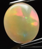 3.85 Carats Natural Yellow Opal Loose at PristineAuction.com
