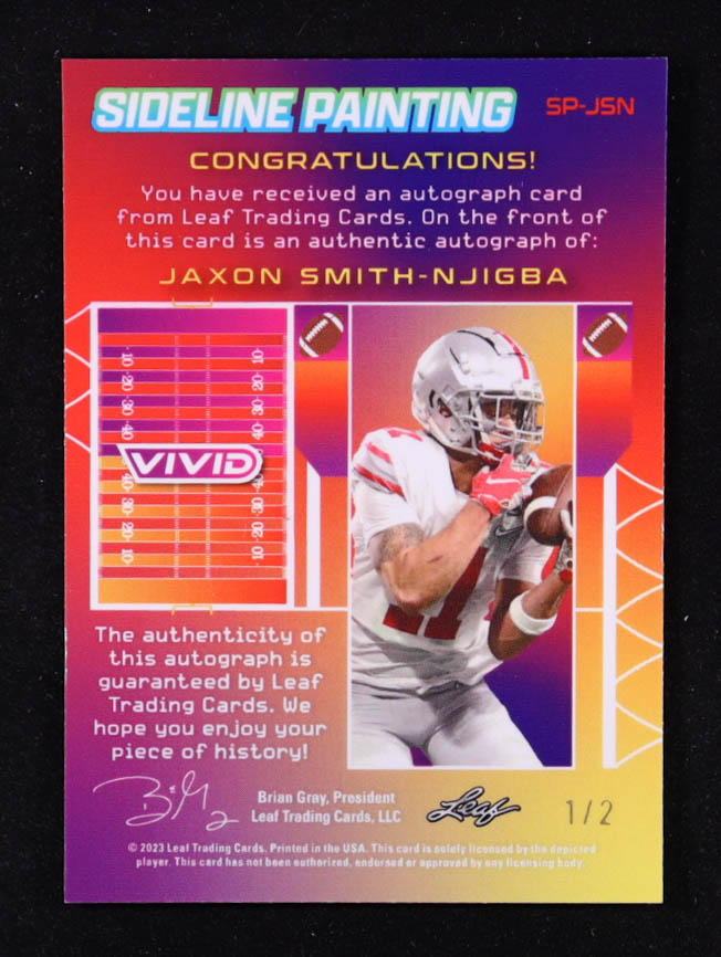 Jaxon Smith-Njigba 2023 Leaf Vivid Autographs Sideline Painting Purple #SPJSN #1/2 RC at PristineAuction.com Jaxon Smith-Njigba 2023 Leaf Vivid Autographs Sideline Painting Purple #SPJSN #1/2 RC at PristineAuction.com