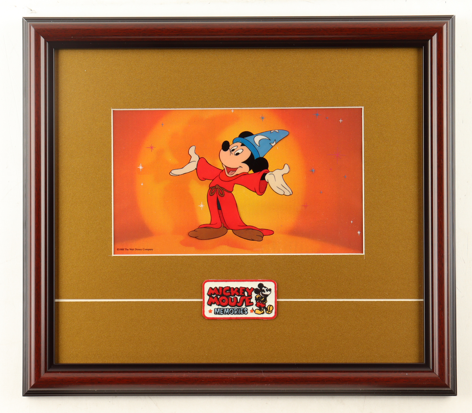 1988 Walt Disney's "The Sorcerer's Apprentice" Two-Piece Custom Framed Animation Film Cel Display with Vintage Mickey Mouse Patch at PristineAuction.com 1988 Walt Disney's "The Sorcerer's Apprentice" Two-Piece Custom Framed Animation Film Cel Display with Vintage Mickey Mouse Patch at PristineAuction.com