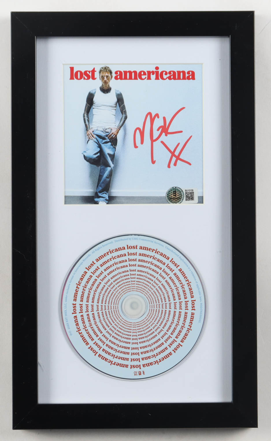 MGK Signed Custom Framed "Lost Americana" CD Album Insert Display With Disc (Beckett) at PristineAuction.com MGK Signed Custom Framed "Lost Americana" CD Album Insert Display With Disc (Beckett) at PristineAuction.com