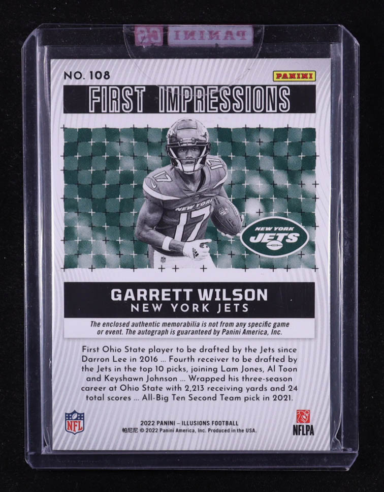 Garrett Wilson 2022 Panini Illusions #108 Jersey Autograph #119/199 EXCH RC at PristineAuction.com Garrett Wilson 2022 Panini Illusions #108 Jersey Autograph #119/199 EXCH RC at PristineAuction.com