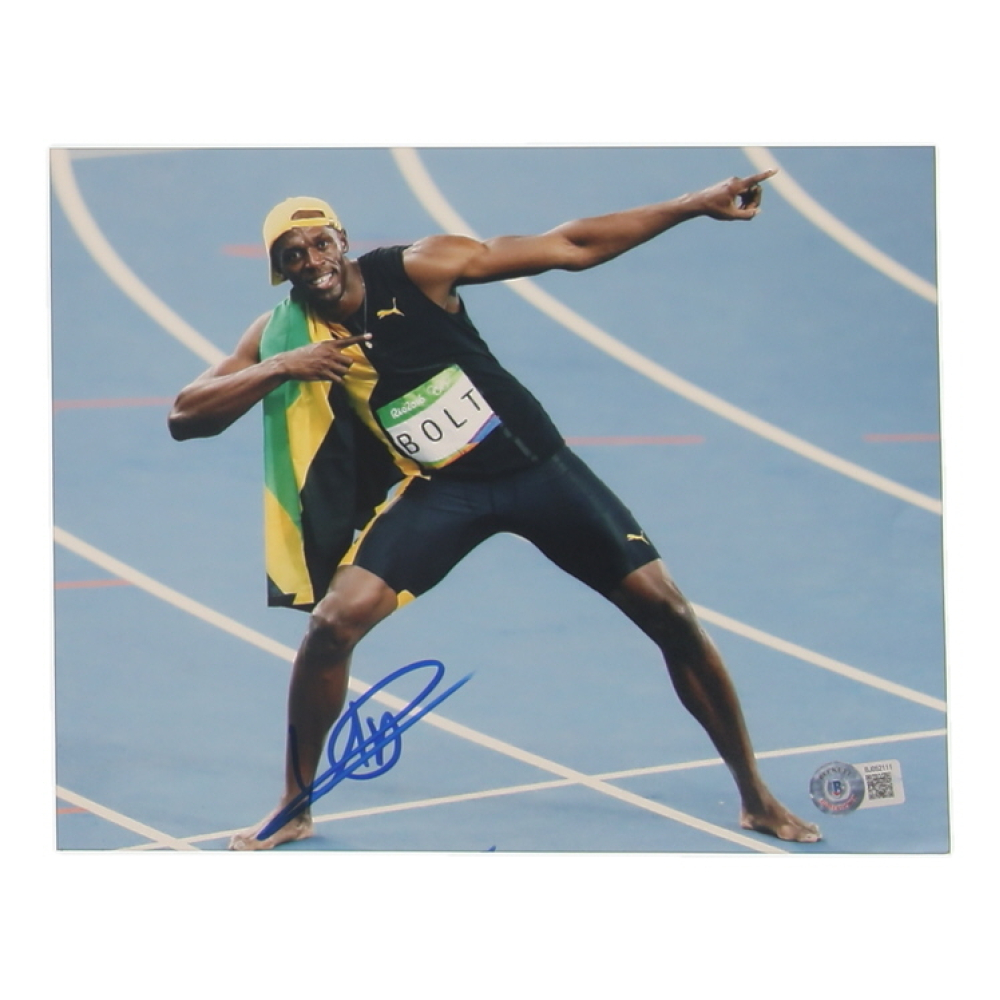 Usain Bolt Signed Team Jamaica 8x10 Photo (Beckett) at PristineAuction.com
