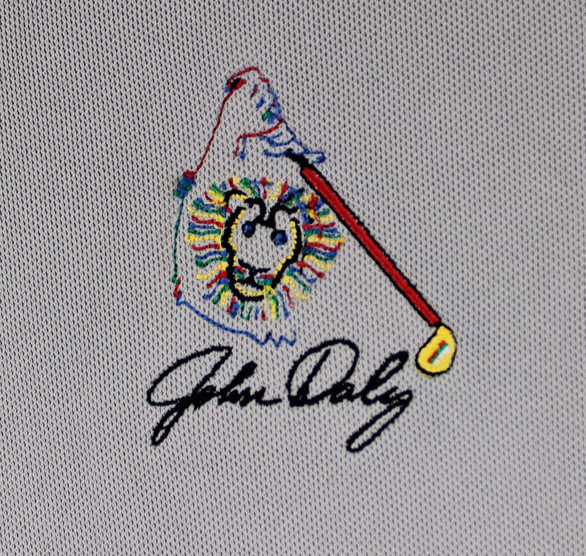 John Daly Signed Loudmouth Polo Shirt (Beckett) at PristineAuction.com John Daly Signed Loudmouth Polo Shirt (Beckett) at PristineAuction.com