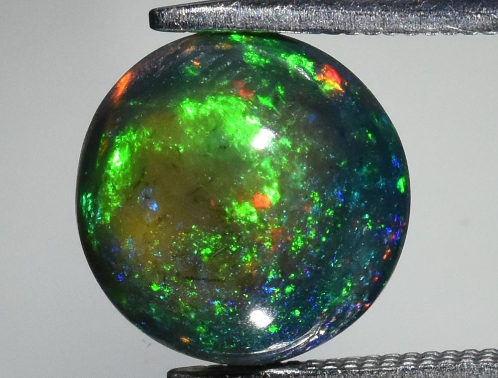1.61 Carats Natural Black Opal Loose at PristineAuction.com 1.61 Carats Natural Black Opal Loose at PristineAuction.com
