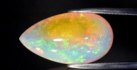 12.72 Carats Natural White Opal Loose at PristineAuction.com