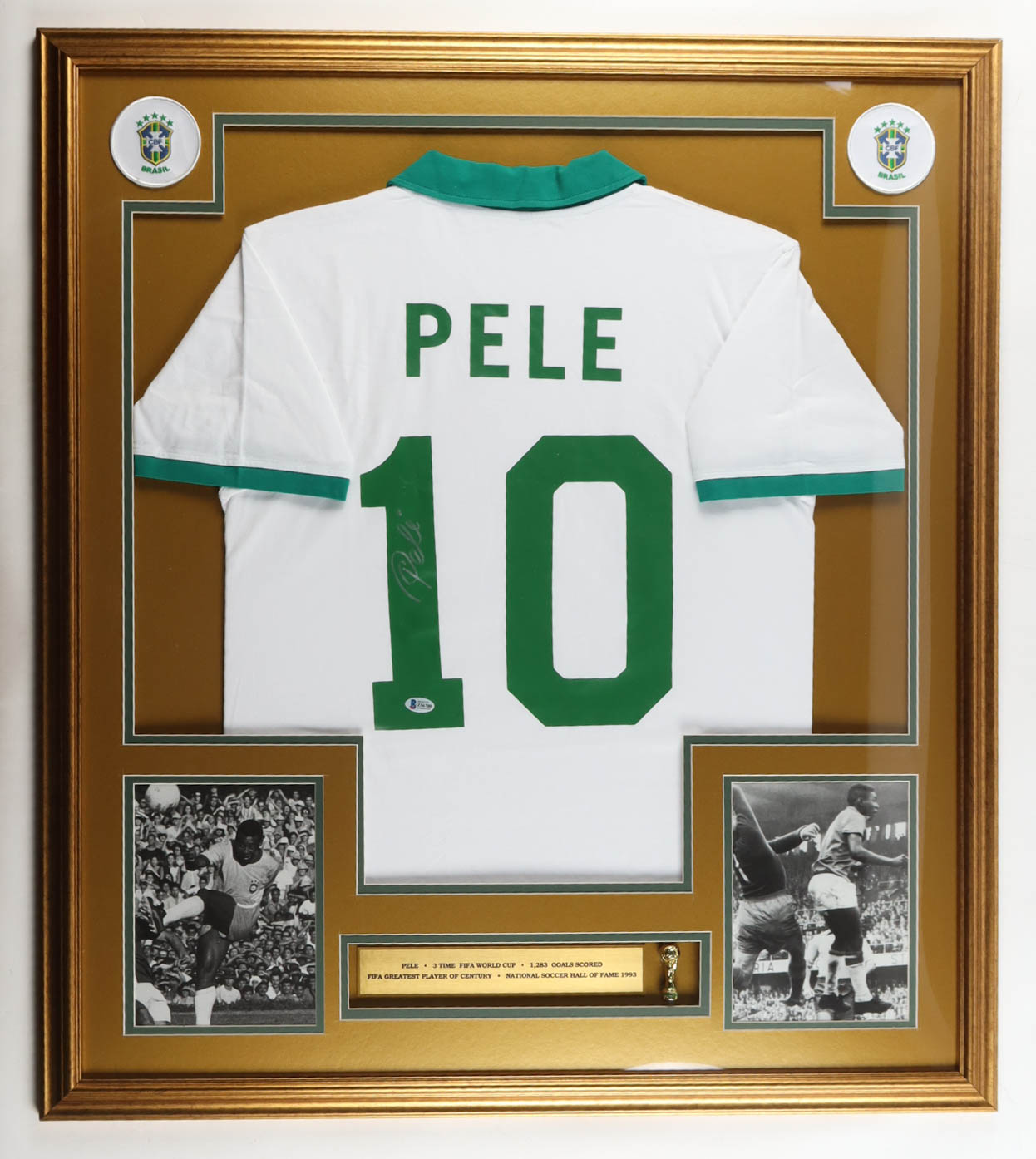 Pele Signed Custom Framed Jersey Display with Trophy Pin & Stat Plaque (Beckett) at PristineAuction.com Pele Signed Custom Framed Jersey Display with Trophy Pin & Stat Plaque (Beckett) at PristineAuction.com