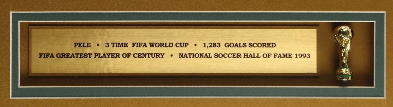 Pele Signed Custom Framed Jersey Display with Trophy Pin & Stat Plaque (Beckett) at PristineAuction.com Pele Signed Custom Framed Jersey Display with Trophy Pin & Stat Plaque (Beckett) at PristineAuction.com