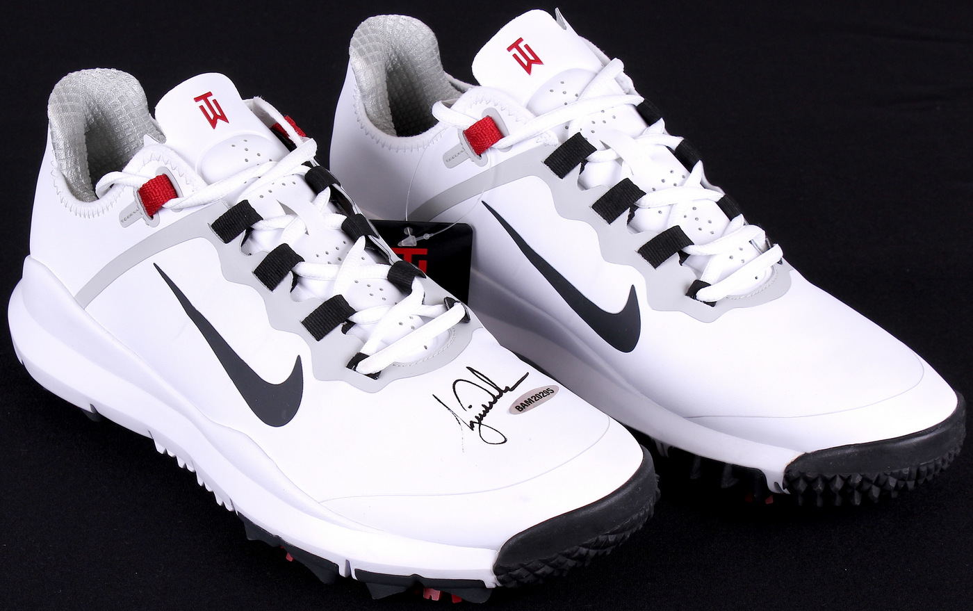 Tiger Woods Signed New Pair of Nike Golf Shoes (UDA COA) at PristineAuction.com Tiger Woods Signed New Pair of Nike Golf Shoes (UDA COA) at PristineAuction.com