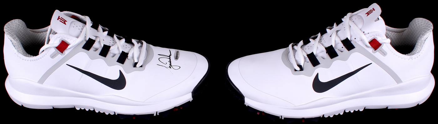 Tiger Woods Signed New Pair of Nike Golf Shoes (UDA COA) at PristineAuction.com Tiger Woods Signed New Pair of Nike Golf Shoes (UDA COA) at PristineAuction.com