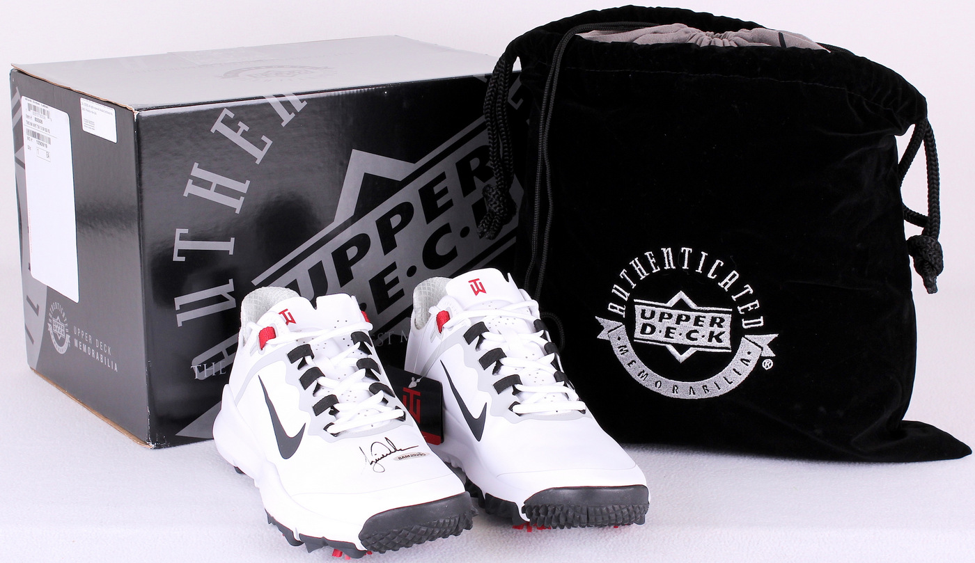 Tiger Woods Signed New Pair of Nike Golf Shoes (UDA COA) at PristineAuction.com Tiger Woods Signed New Pair of Nike Golf Shoes (UDA COA) at PristineAuction.com