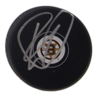Elias Lindholm Signed Bruins Logo Hockey Puck (JSA) at PristineAuction.com