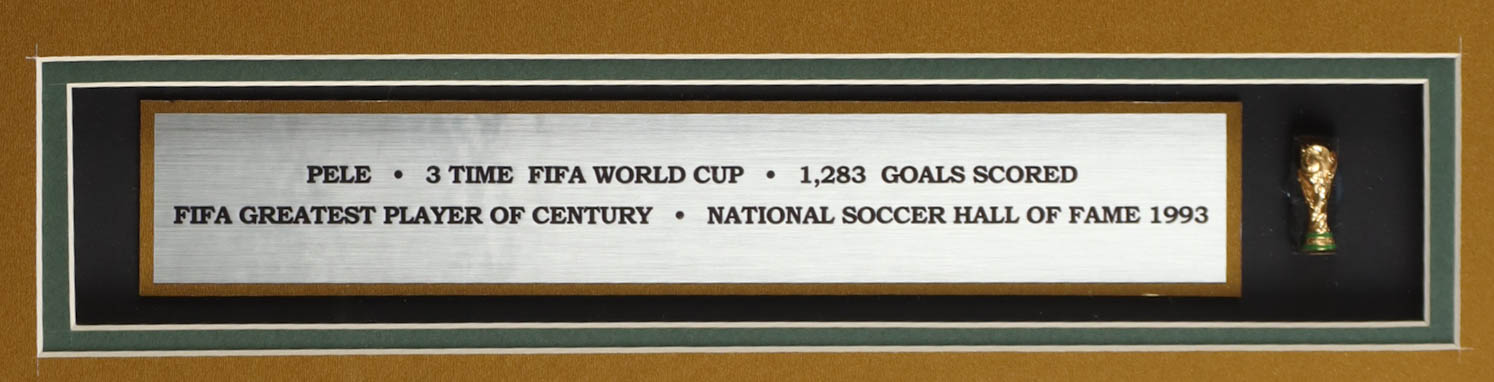 Pele Signed Custom Framed Jersey Display with Trophy Pin & Stat Plaque (PSA) at PristineAuction.com Pele Signed Custom Framed Jersey Display with Trophy Pin & Stat Plaque (PSA) at PristineAuction.com