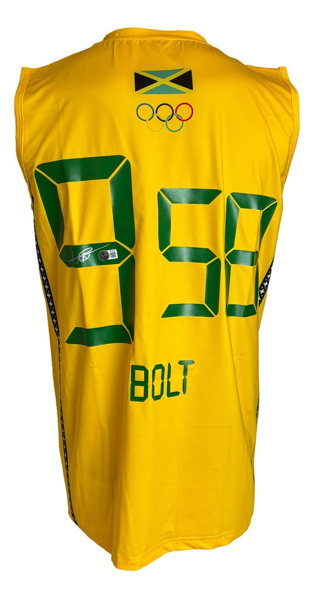 Usain Bolt Signed Team Jamaica Puma Authentic Track Shirt (Beckett) at PristineAuction.com Usain Bolt Signed Team Jamaica Puma Authentic Track Shirt (Beckett) at PristineAuction.com