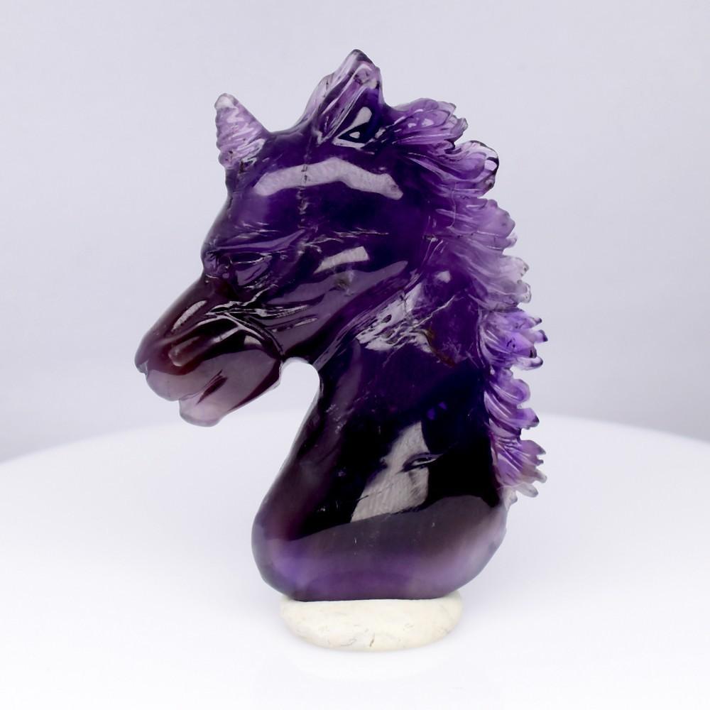67.93 Carats Natural Amethyst Carving of a Unicorn at PristineAuction.com 67.93 Carats Natural Amethyst Carving of a Unicorn at PristineAuction.com